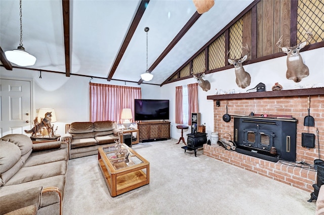 6 Hickory Holw, Huntsville, TX 77320 - living area with a wood stove, beamed ceiling, carpet floors, and high vaulted ceiling