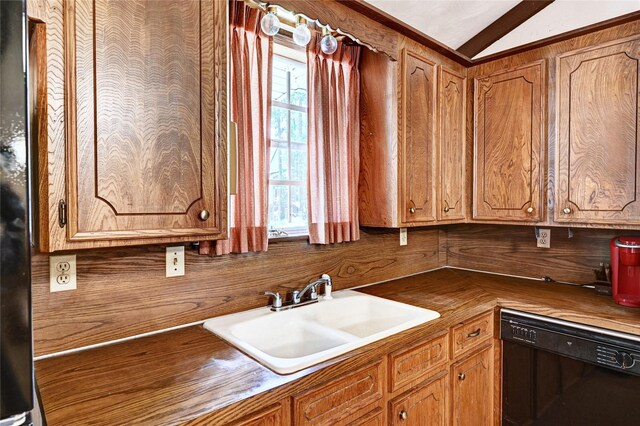 6 Hickory Holw, Huntsville, TX 77320 - kitchen with dishwasher, a sink, plenty of natural light, vaulted ceiling, and brown cabinets