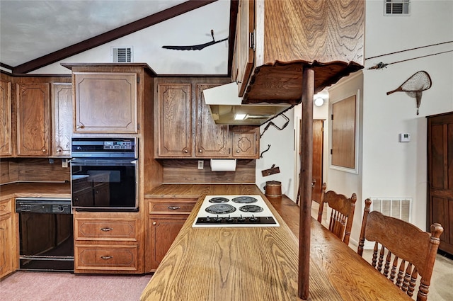6 Hickory Holw, Huntsville, TX 77320 - kitchen with black appliances, under cabinet range hood, and light colored carpet
