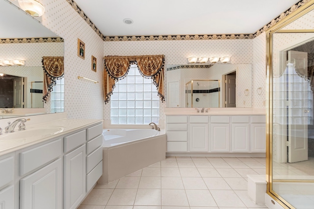 3915 Garnet Fls, Sugar Land, TX 77479 - full bathroom featuring a shower stall, two vanities, a bath, tile patterned flooring, and wallpapered walls