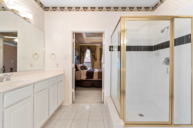 3915 Garnet Fls, Sugar Land, TX 77479 - full bathroom with wallpapered walls, ensuite bathroom, vanity, a stall shower, and ornamental molding