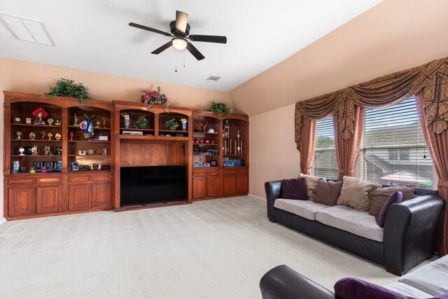 3915 Garnet Fls, Sugar Land, TX 77479 - living area with light carpet, ceiling fan, and vaulted ceiling
