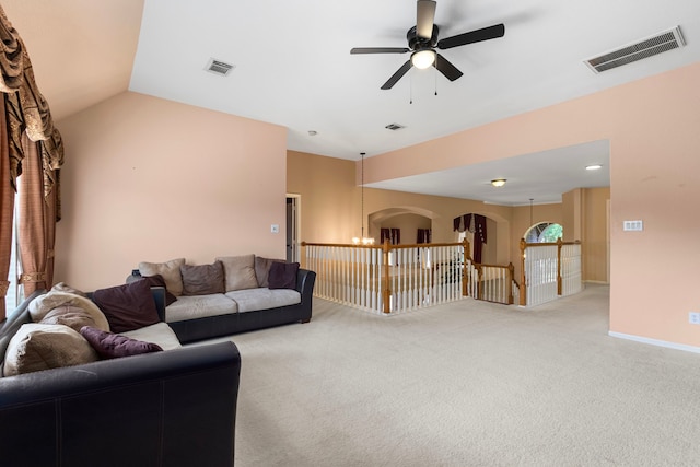 3915 Garnet Fls, Sugar Land, TX 77479 - living area with ceiling fan, light colored carpet, a chandelier, arched walkways, and lofted ceiling