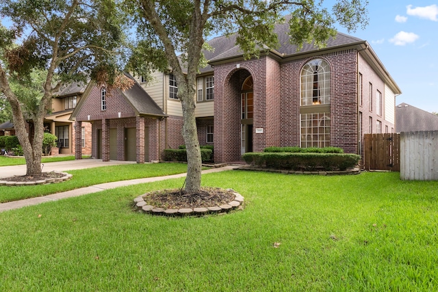3915 Garnet Fls, Sugar Land, TX 77479 - view of front of home with brick siding, a garage, driveway, and roof with shingles