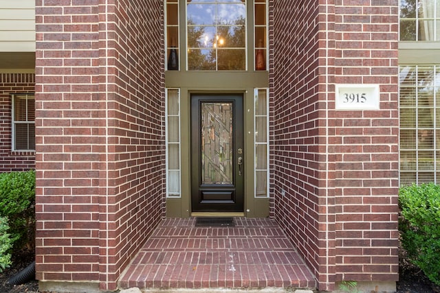 3915 Garnet Fls, Sugar Land, TX 77479 - doorway to property featuring brick siding