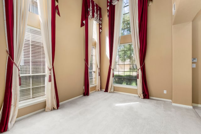 3915 Garnet Fls, Sugar Land, TX 77479 - unfurnished room with plenty of natural light, carpet, and baseboards