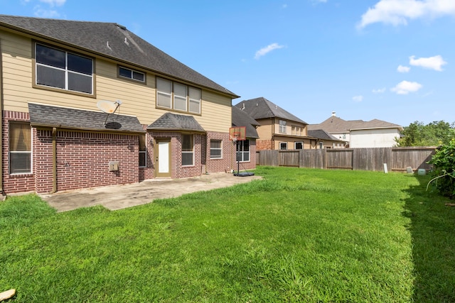 3915 Garnet Fls, Sugar Land, TX 77479 - back of house with brick siding, a patio area, and a shingled roof