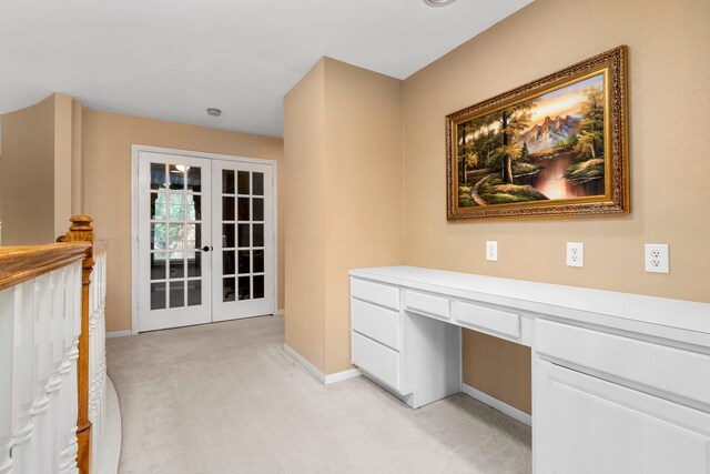 3915 Garnet Fls, Sugar Land, TX 77479 - unfurnished office with french doors, light colored carpet, built in study area, and baseboards
