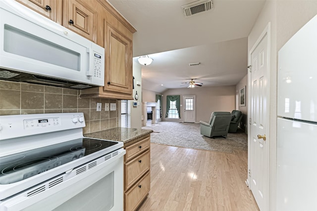 404 Live Oak Ln, Friendswood, TX 77546 - kitchen featuring white appliances, light wood finished floors, tasteful backsplash, and a ceiling fan