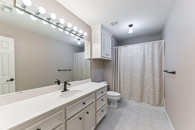 404 Live Oak Ln, Friendswood, TX 77546 - full bathroom featuring vanity, toilet, tile patterned floors, and curtained shower