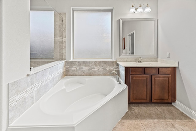 18810 Peachleaf Willow Trce, Cypress, TX 77429 - bathroom featuring a bath, vanity, and tile patterned floors