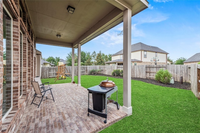 18810 Peachleaf Willow Trce, Cypress, TX 77429 - view of patio featuring a playground
