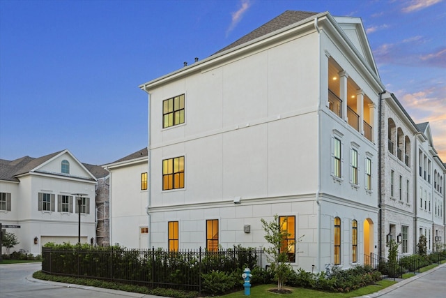 213 Sutton Row Pl, Houston, TX 77024 - view of property at dusk