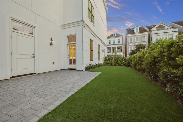 213 Sutton Row Pl, Houston, TX 77024 - view of grassy yard with a patio area