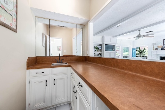 9911 Oxted Ln, Spring, TX 77379 - bar featuring a sink and ceiling fan