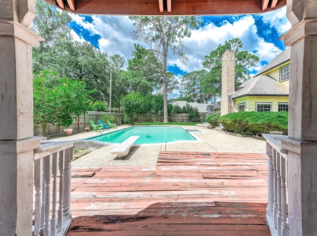 9911 Oxted Ln, Spring, TX 77379 - view of pool featuring a fenced backyard, a deck, a patio, and a diving board