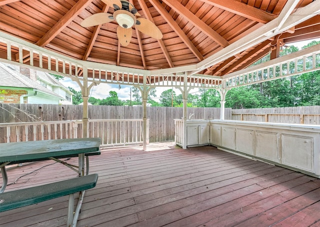 9911 Oxted Ln, Spring, TX 77379 - wooden deck featuring a ceiling fan, a gazebo, and a sink