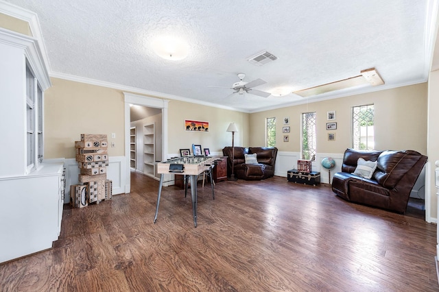 9911 Oxted Ln, Spring, TX 77379 - office with attic access, dark wood-style floors, a textured ceiling, a ceiling fan, and ornamental molding