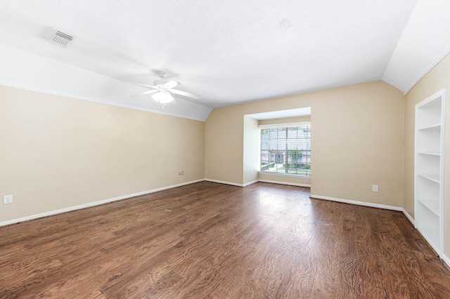 9911 Oxted Ln, Spring, TX 77379 - unfurnished room with lofted ceiling, a ceiling fan, baseboards, and wood finished floors