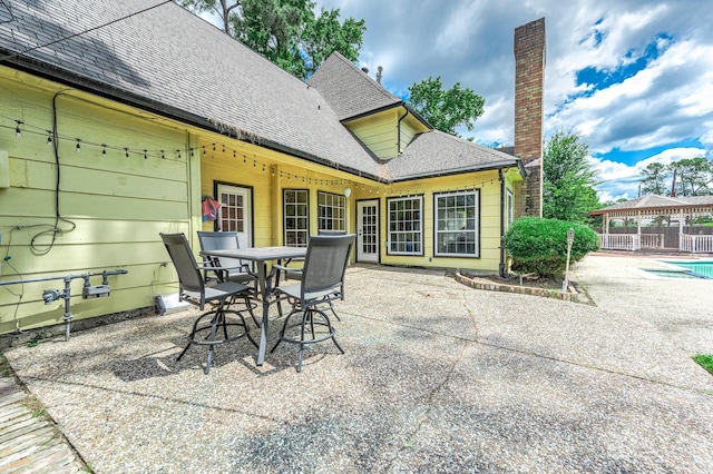 9911 Oxted Ln, Spring, TX 77379 - view of patio / terrace featuring a gazebo and outdoor dining space