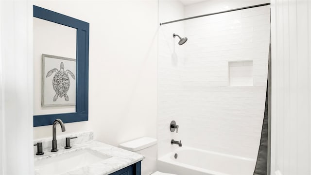 1066 Shady Ln, Gilchrist, TX 77650 - bathroom with toilet, vanity, and shower / tub combo with curtain