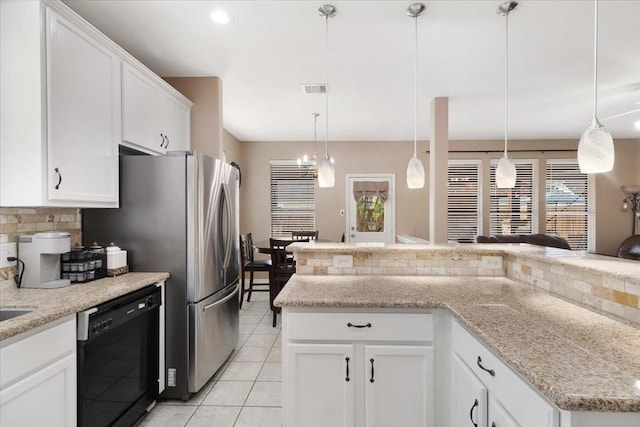 8418 Kirkbrook Dr, Houston, TX 77089 - kitchen with dishwasher, decorative backsplash, white cabinets, light tile patterned floors, and hanging light fixtures
