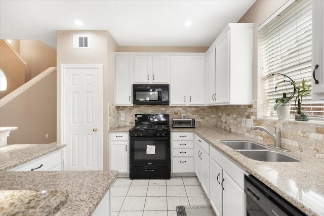 8418 Kirkbrook Dr, Houston, TX 77089 - kitchen with black appliances, a sink, decorative backsplash, white cabinetry, and light tile patterned floors