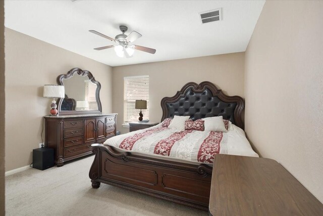 8418 Kirkbrook Dr, Houston, TX 77089 - bedroom with light colored carpet, ceiling fan, and baseboards