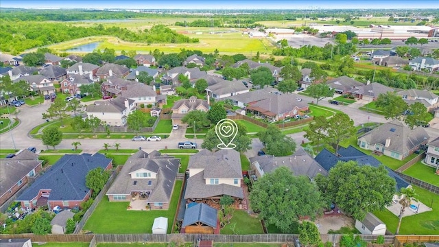8418 Kirkbrook Dr, Houston, TX 77089 - aerial view of property's location with nearby suburban area and a nearby body of water