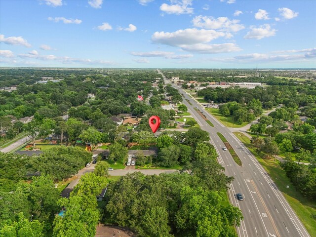 110 Marshall St, League City, TX 77573 - aerial view of property's location featuring a highway and a tree filled landscape