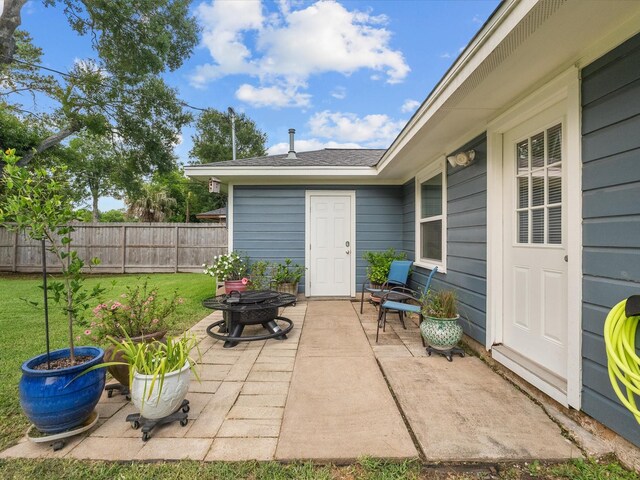 110 Marshall St, League City, TX 77573 - view of patio / terrace with an outdoor fire pit