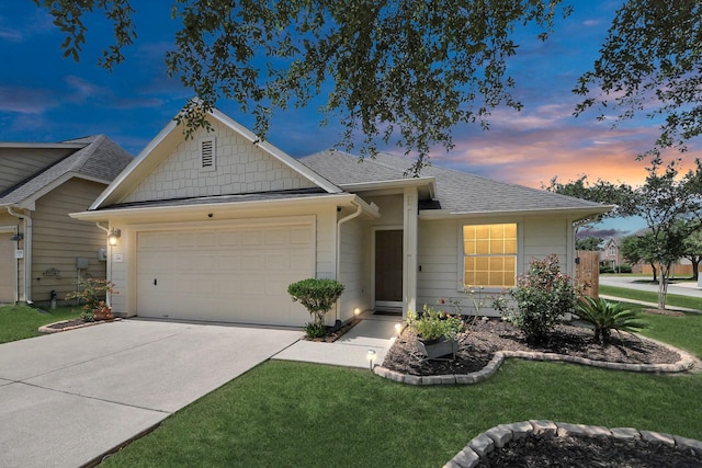 12943 Palm Leaf Ct, Houston, TX 77044 - ranch-style home with a garage, roof with shingles, driveway, and a front yard