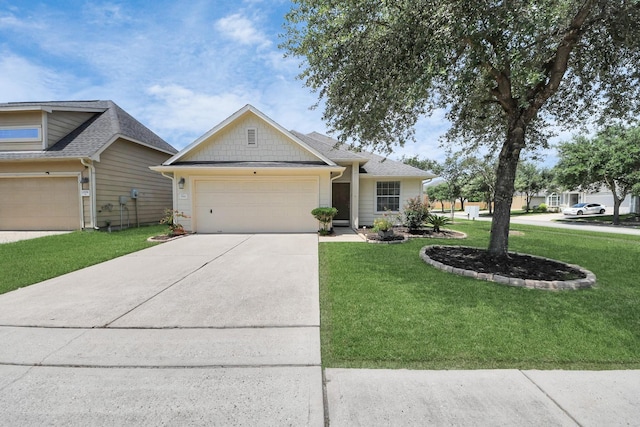 12943 Palm Leaf Ct, Houston, TX 77044 - view of front of property featuring a front lawn, a garage, driveway, and a shingled roof