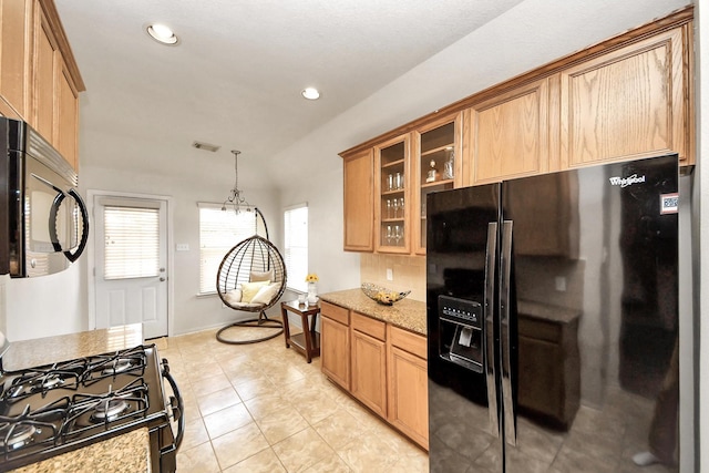 12943 Palm Leaf Ct, Houston, TX 77044 - kitchen with black appliances, glass insert cabinets, light tile patterned flooring, light stone counters, and recessed lighting