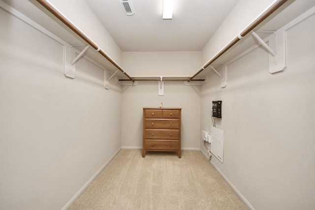12943 Palm Leaf Ct, Houston, TX 77044 - walk in closet featuring light carpet