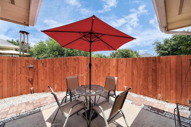 12943 Palm Leaf Ct, Houston, TX 77044 - view of patio / terrace with outdoor dining space