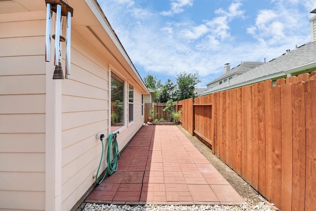 12943 Palm Leaf Ct, Houston, TX 77044 - fenced backyard with a patio area