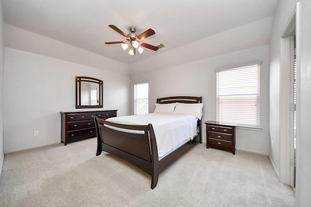 12943 Palm Leaf Ct, Houston, TX 77044 - bedroom with light carpet, a ceiling fan, and baseboards
