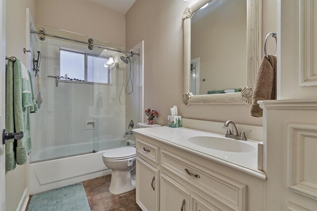 167 Monterrey Rd E, Montgomery, TX 77356 - full bathroom featuring vanity, enclosed tub / shower combo, toilet, and tile patterned flooring