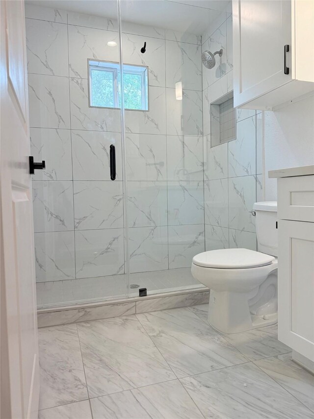 115 Penick Rd, Waller, TX 77484 - bathroom with marble look tiles, a marble finish shower, toilet, and vanity