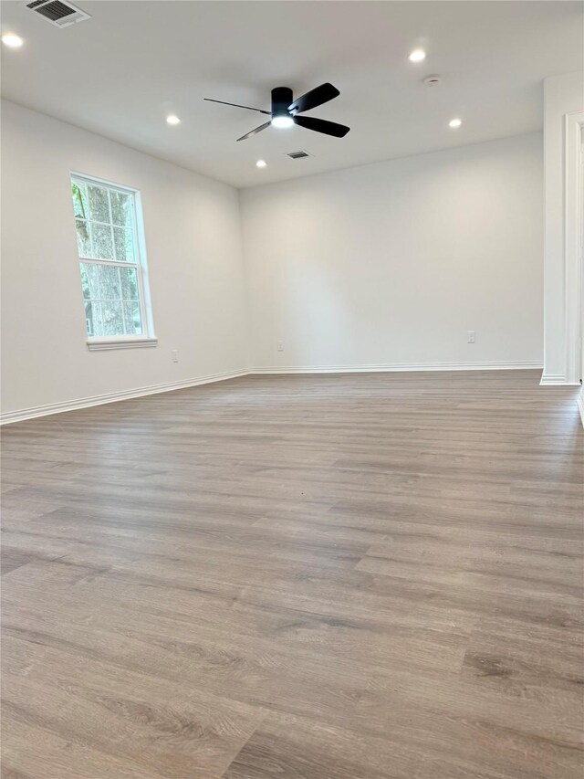 115 Penick Rd, Waller, TX 77484 - spare room featuring recessed lighting, baseboards, wood finished floors, and ceiling fan