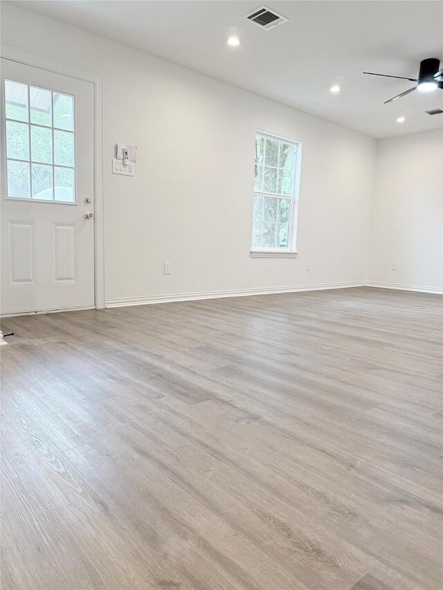 115 Penick Rd, Waller, TX 77484 - spare room featuring light wood-type flooring, baseboards, a ceiling fan, and recessed lighting