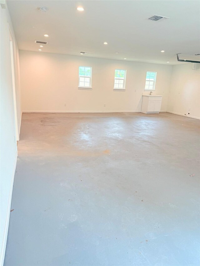 115 Penick Rd, Waller, TX 77484 - basement featuring recessed lighting, baseboards, and a sink