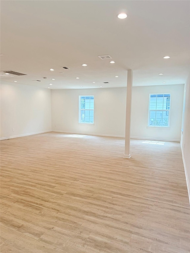 115 Penick Rd, Waller, TX 77484 - below grade area featuring light wood finished floors, baseboards, and recessed lighting