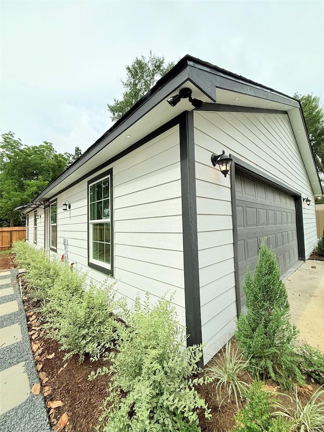 115 Penick Rd, Waller, TX 77484 - view of home's exterior with a garage