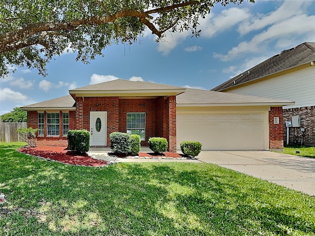 422 Magnolia Way, League City, TX 77573 - view of front of home with an attached garage, driveway, and brick siding