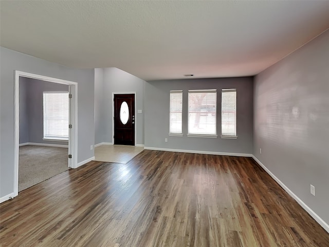 422 Magnolia Way, League City, TX 77573 - entryway featuring dark wood-style floors and baseboards