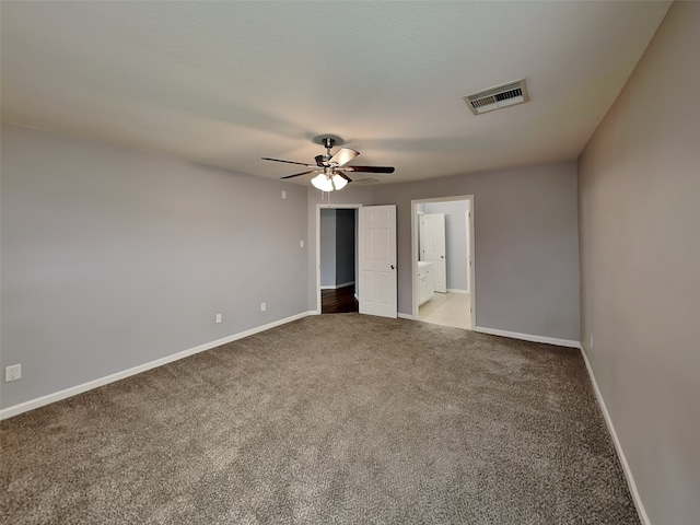 422 Magnolia Way, League City, TX 77573 - empty room featuring a ceiling fan, carpet, and baseboards