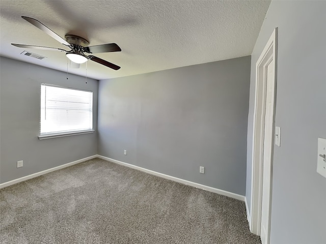 422 Magnolia Way, League City, TX 77573 - empty room featuring a ceiling fan, carpet, baseboards, and a textured ceiling
