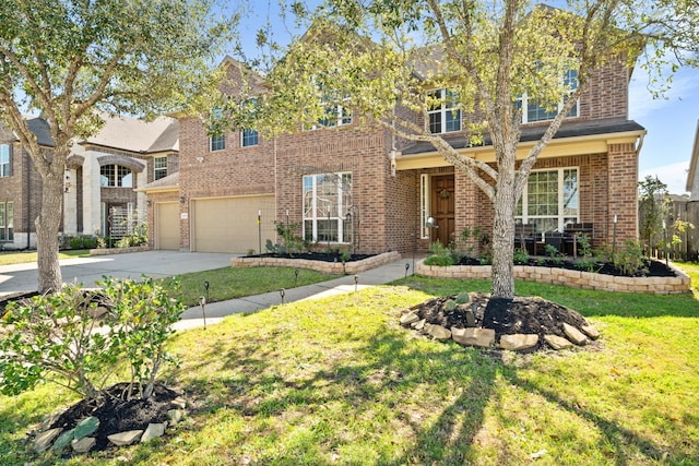 25611 Kearsley Dr, Katy, TX 77494 - traditional-style home featuring a garage, brick siding, concrete driveway, and a front lawn